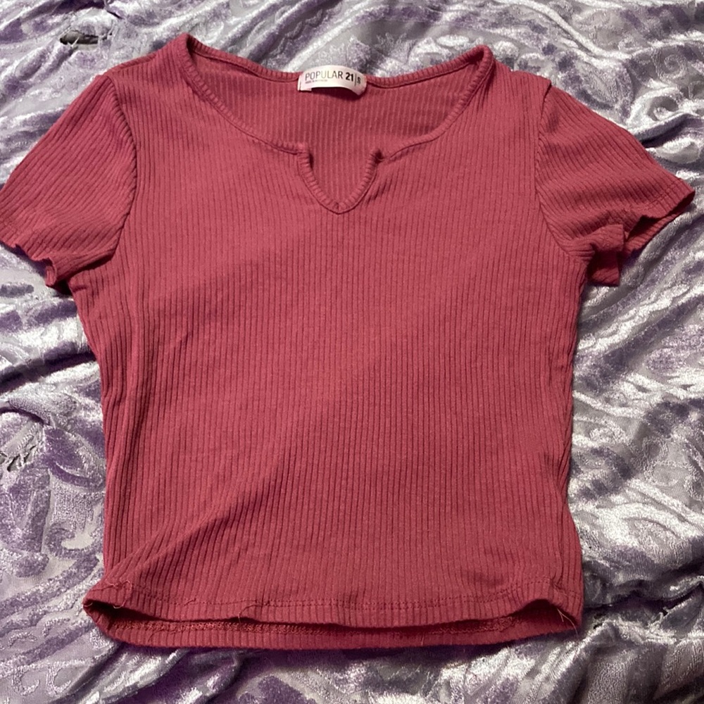 Small pinkish colored crop top